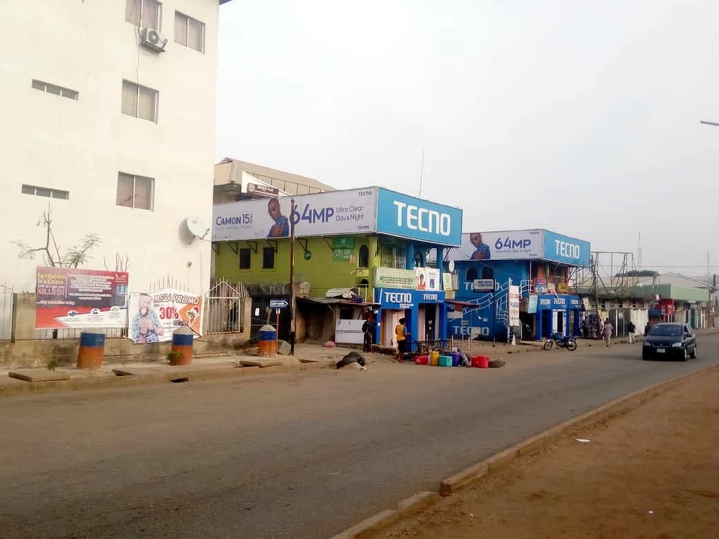 TECNO outdoor façade and billboard branding